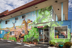 Stay at our Santa Cruz hotel with vibrant exterior mural!