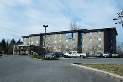 Hotel Exterior and Parking Lot