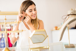 Woman Trying on Jewelry