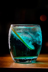 Blue Mixed Drink With Lemon Slice